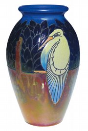 Jean Barol, a French potter, made this 8-inch vase decorated with birds and metallic luster glaze. It sold recently at a Cincinnati Art Galleries auction for 1.